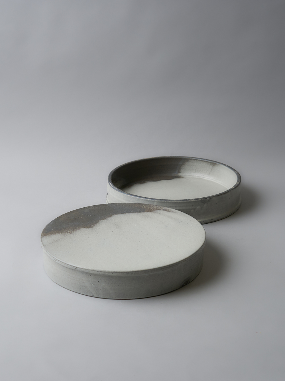 8.5 Reversible Elevated Plate<br />Ash and white clay glaze