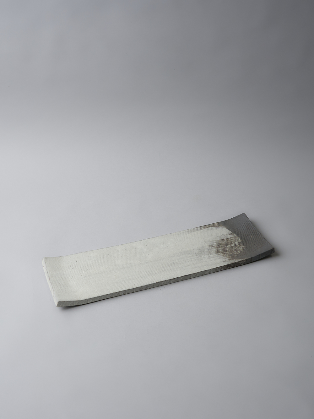 15.0 Long Rectangular Plate <br />Ash and white clay glaze, comb pattern